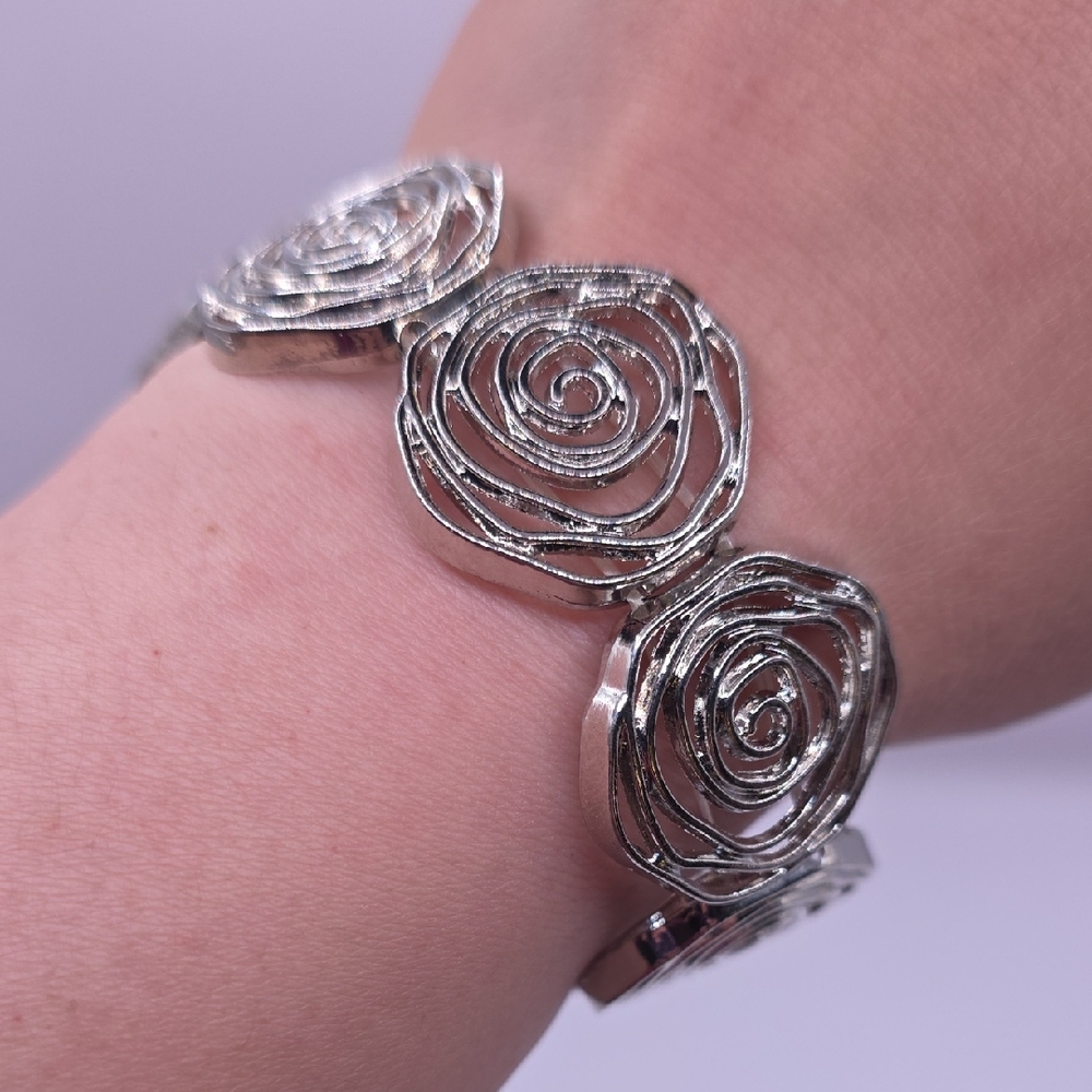 Floral Motif Silvertone Stretch Bracelet
